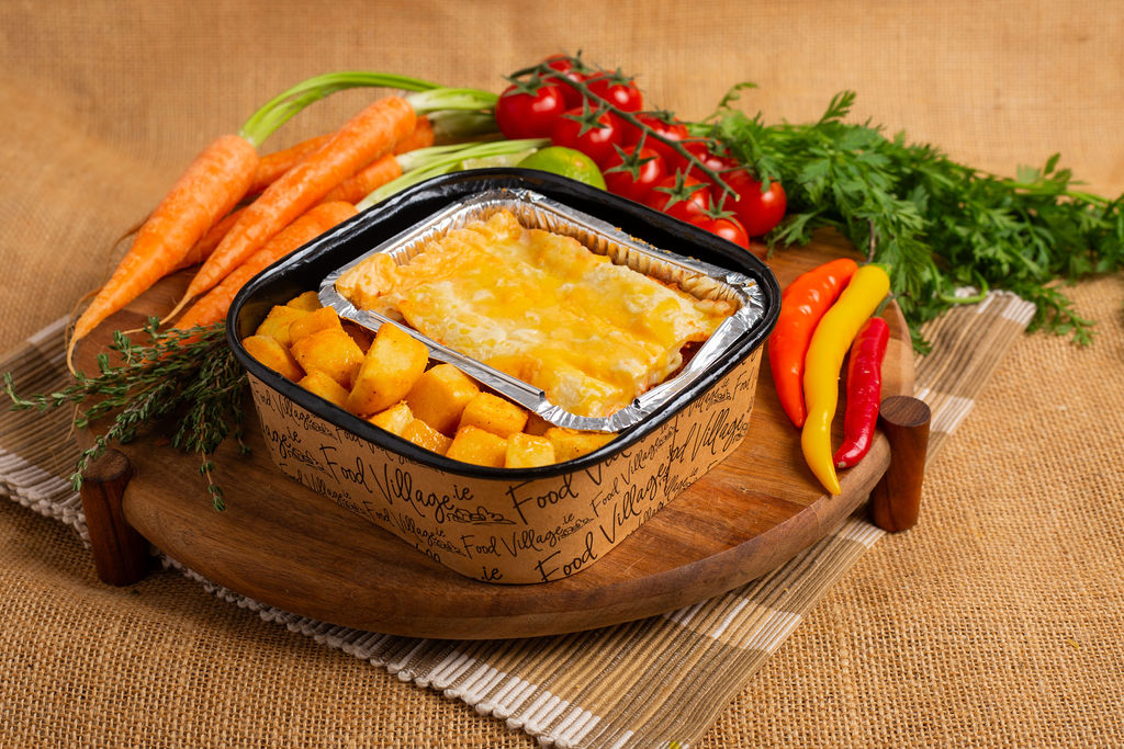 Food Village School Meals Homemade Beef Lasagne served with Oven Baked Potato Cubes