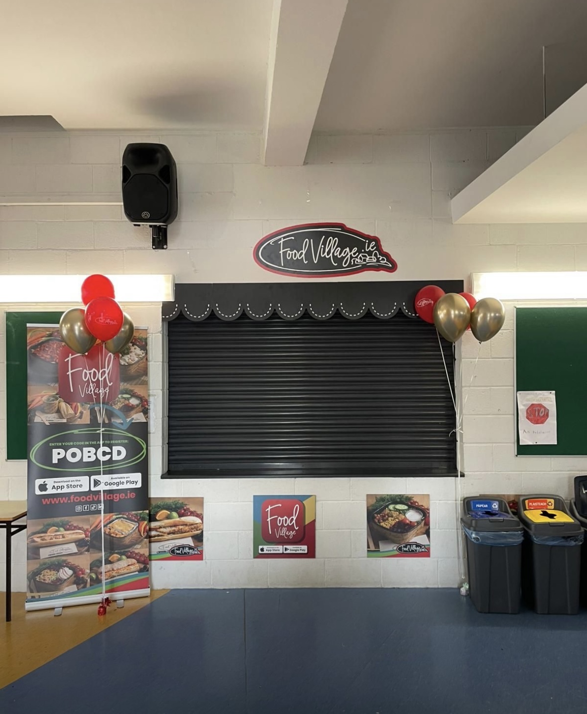 Screenshot Food Village branded school canteen service area decorated for a new school launch.
